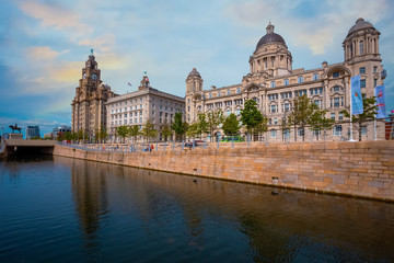 Fototapeta na wymiar Liverpool Pier Head with the Royal Liver Building, Cunard Building and Port of Liverpool Building