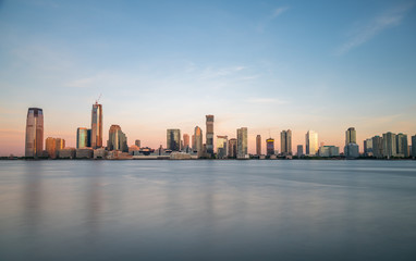 Fototapeta na wymiar Long Exposure Panormic View of New Jersey Architecture At Sunrise