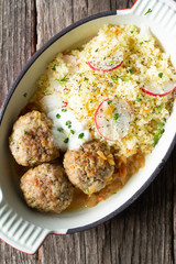 meatballs and couscous with greens