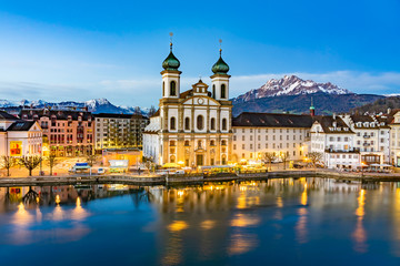 Panoramic view of Lucerne with the bridge Kapellbrucke, Wasserturm Tower and the Church of the Jesuits, Lucerne, Switzerland.