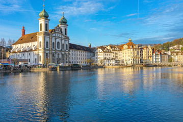 Fototapeta na wymiar Panoramic view of Lucerne with the bridge Kapellbrucke, Wasserturm Tower and the Church of the Jesuits, Lucerne, Switzerland.