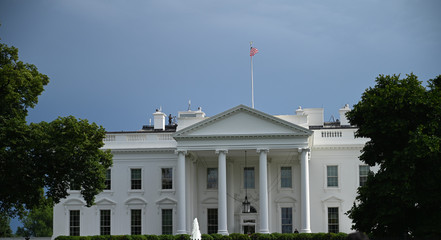 American Flag Waving On The UNITED STATES CAPITOL, WASHINGTON, D.C.