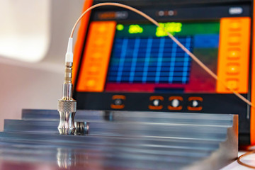 Ultrasonic metal inspection. Oscilloscope with color touchscreen. Testing and measuring equipment....