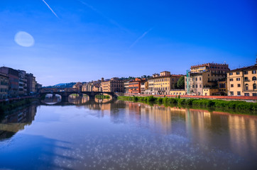 Fototapeta na wymiar Florence, along the Arno River, in the Tuscany region of Italy.