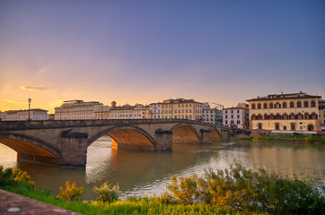 Fototapeta premium Florence, along the Arno River, in the Tuscany region of Italy.