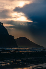 Waves and Rocks at Beach at Sunrise