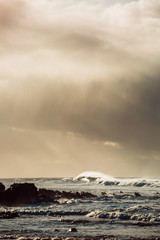 Waves and Rocks at Beach at Sunrise