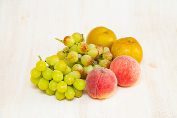 Naklejka na ściany i meble Muscat grape ,peach,peer on the white background