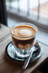 Hot coffee cappuccino on wood table