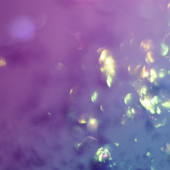 Abstract background of glitter and foil hologram.