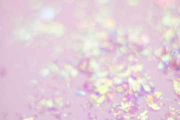 Abstract background of glitter and foil hologram.