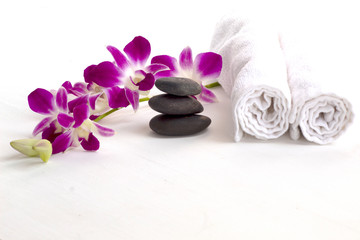 Fototapeta na wymiar stone spa and orchid on white background