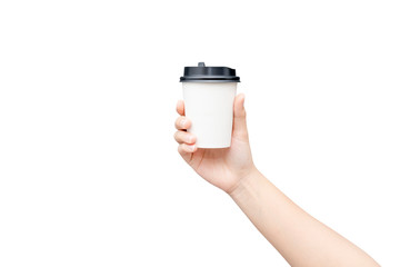 Take away coffee cup background. Female hand holding a coffee paper cup isolated on white background with clipping path. Close-up.