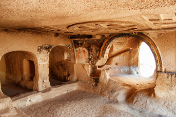 Awesome interior of ancient rock-cut temple, Cappadocia, Turkey - obrazy, fototapety, plakaty