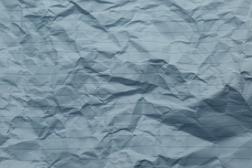 crumpled of blue blank paper with line