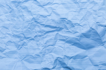 crumpled of blue blank paper with line