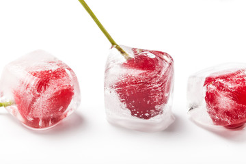 Frozen cherries on a white background