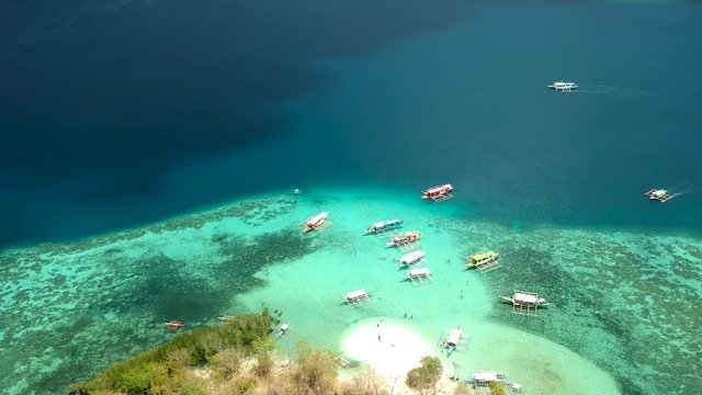 Aerial fly over of CYC beach on CYC Island, Coron town, Philippines