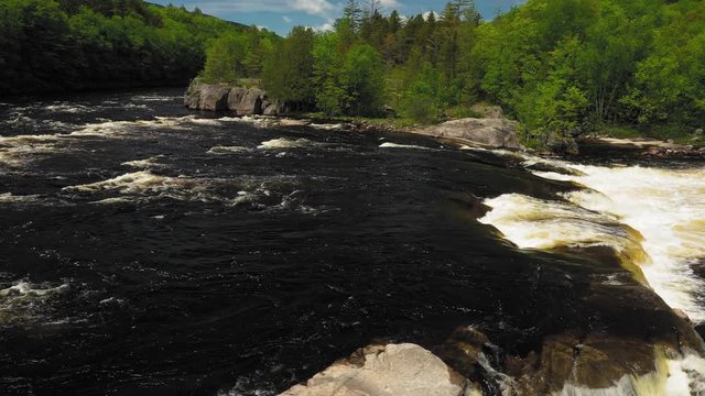 Slide right over Nesowdnehunk Falls on the Penobscot River in Baxter State Park AERIAL