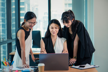 working women woking together in office