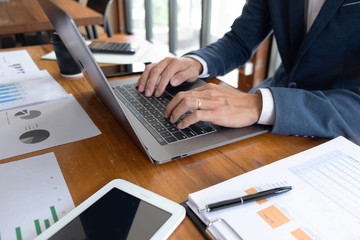 Businessmen, finance, accounting work, checking accounts, using calculators and finding information