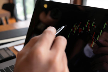 Businessmen, finance, accounting work, checking accounts, using calculators and finding information