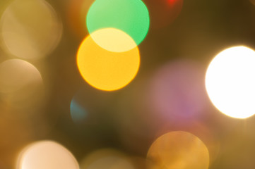 Colourful festive multi-colored circles . Defocused abstract multicolored bokeh lights background.