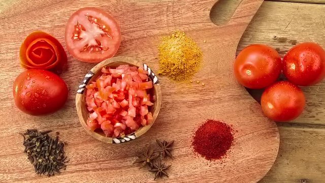 Vegetable cooking preparation chopping table top colourful tasty onion tomato herbs masala vegan