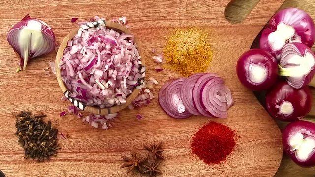 Vegetable cooking preparation chopping table top colourful tasty onion tomato herbs masala vegan