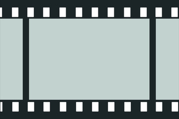 Fototapeta premium A fragment of photographic film with empty frames for a vector background.