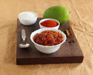 Aam chunda or raw mango preserve is an Indian vegetarian side dish, for items like chapati, poori, roti and idli, native to the state of Gujarat, India.
