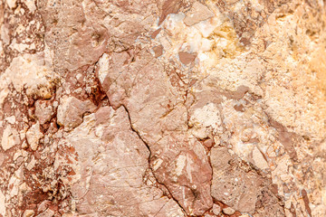 The texture of the walls of antique buildings. A rock. Background close-up. Space for text.