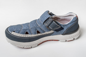 Pair of blue sport shoes isolated on white