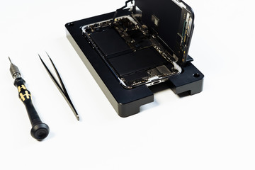 Disassembled Open Mobile Phone Maintenance Tool Isolated on White Background. Dismantle Smartphone Device. Cellphone Motherboard, Chip and Battery. Telephone Fix and Upgrade Service Lab