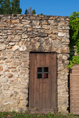 Fototapeta na wymiar Detail of an old wooden door in France