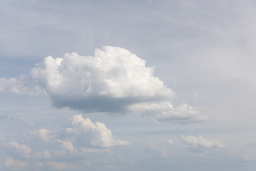 White cumulus clouds on and blue sky, copy space