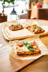 slice of italian pizza in the pizzeria