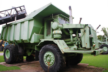 Old transport trucks used in lignite coal mining at long time ago.