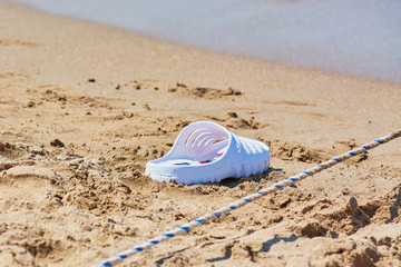 Fototapeta na wymiar White patche on the sandy seashore.
