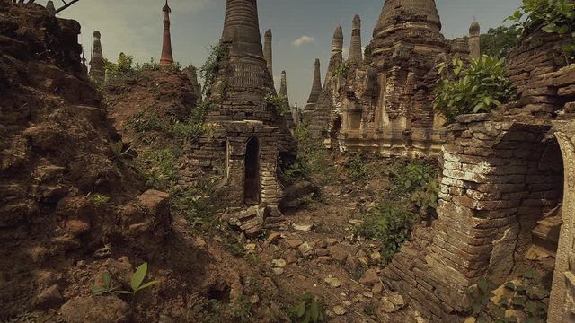 Bagan is an ancient city with thousands of historic buddhist temples and stupas. view of a ruined pagodas.