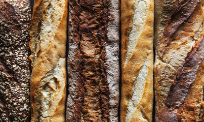 Baguette mix on a black background. French pastries, homemade.