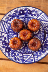 French pastry Caneles de bordeaux rum and vanilla flavor thick caramelized..