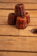 French pastry Caneles de bordeaux rum and vanilla flavor thick caramelized..