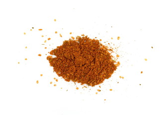 Grounded spice ingredient of dry mix vegetables isolated on white. Chicken spices. A pile of a yellow spice mix. Spices consist dried dehydrated vegetables carrot paprika onion garlic parsnip parsley 