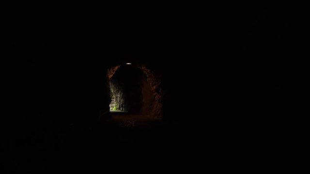 Walking Through Tunnels at Taroko Gorge National Park in Taiwan with Beautiful Rocky Marble Canyon and Dangerous Cliffs