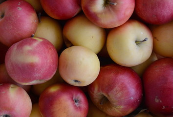 Apples on the market. Fresh organic red apples from the local farmers market. Apples background background texture seasoning Apples for sale. 