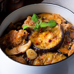 Veal goulash with baked aubergine and herbs