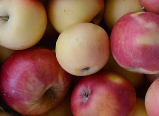 Apples on the market. Fresh organic red apples from the local farmers market. Apples background background texture seasoning Apples for sale. 