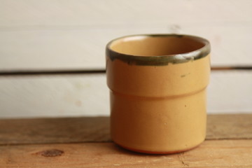 earthenware glass filled with red wine