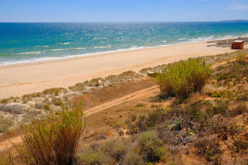 View on the beautiful beach Praia da Rocha Baixinha Nascente in Algarve, Portugal.